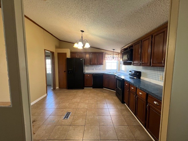 437 Halltown Road Portland, TN 37148 - Photo 9 of 14 a large kitchen with cabinets and stainless steel appliances