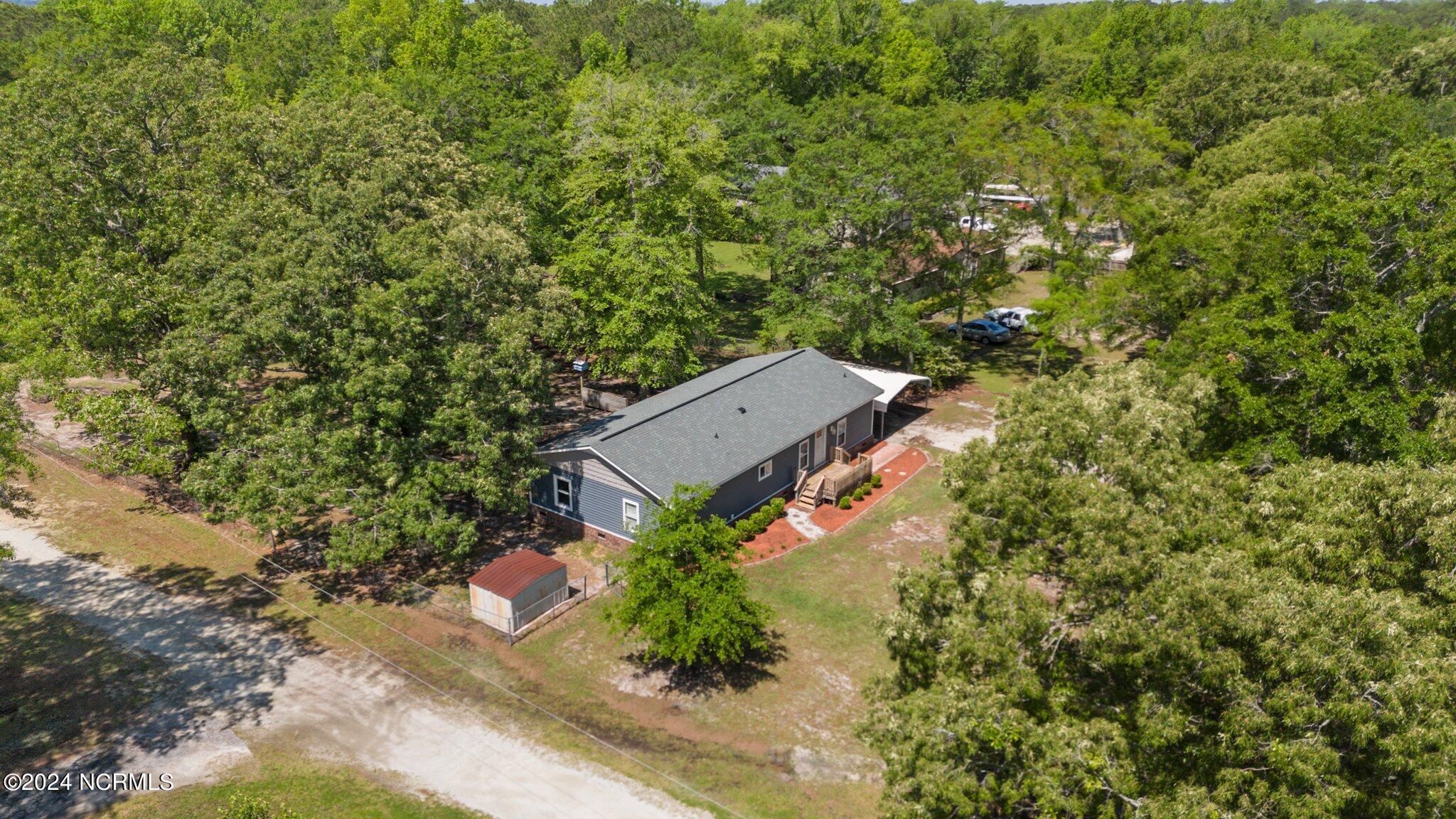 405 Sand Ridge Road New Bern, NC 28560 - Photo 4 of 36 4-web-or-mls-DJI_20240502114206_0227_D