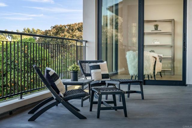 a view of a bunch of trees in a field
