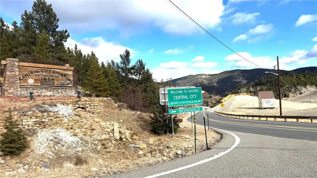 a view of a terrace with wooden fence