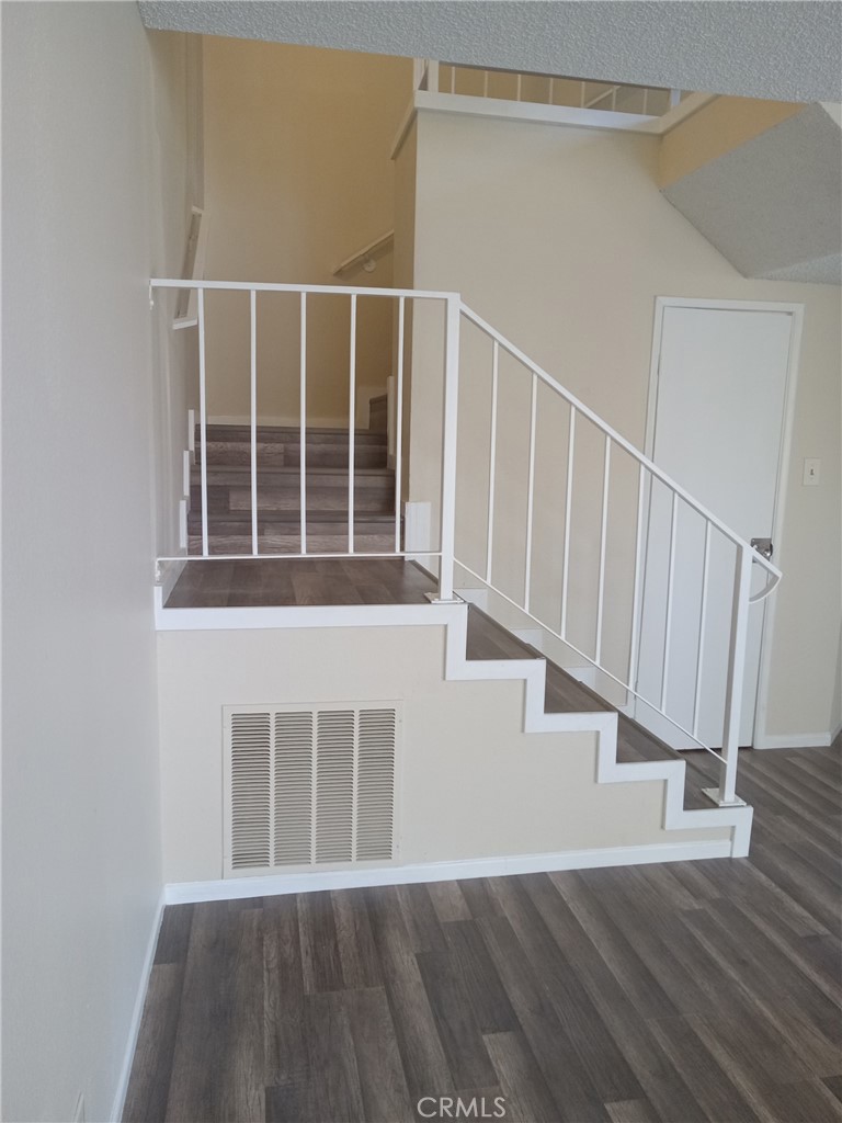 134 Racquet Club Drive Compton, CA 90220 - Photo 7 of 9 staircase to bedrooms and loft