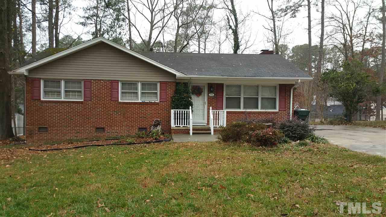 716 Cooper Road Raleigh, NC 27610 - Photo 1 of 25 a front view of a house with yard