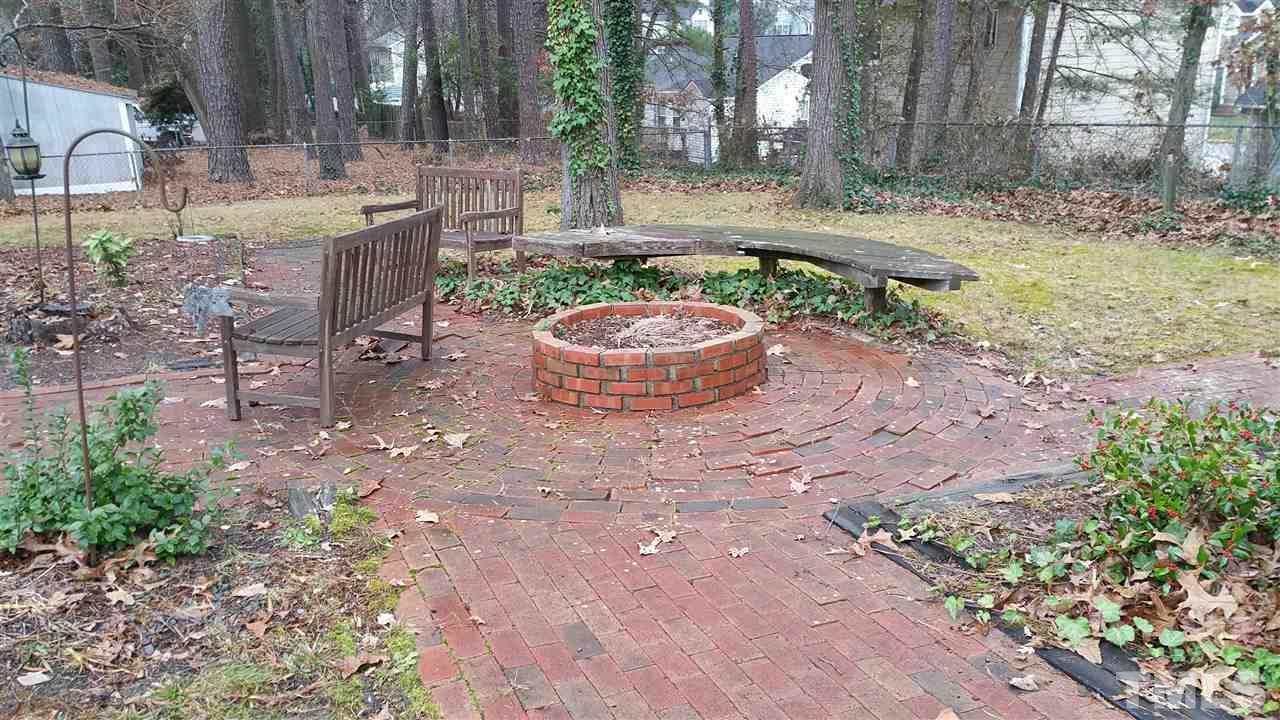 716 Cooper Road Raleigh, NC 27610 - Photo 17 of 25 a view of a house with backyard and sitting area