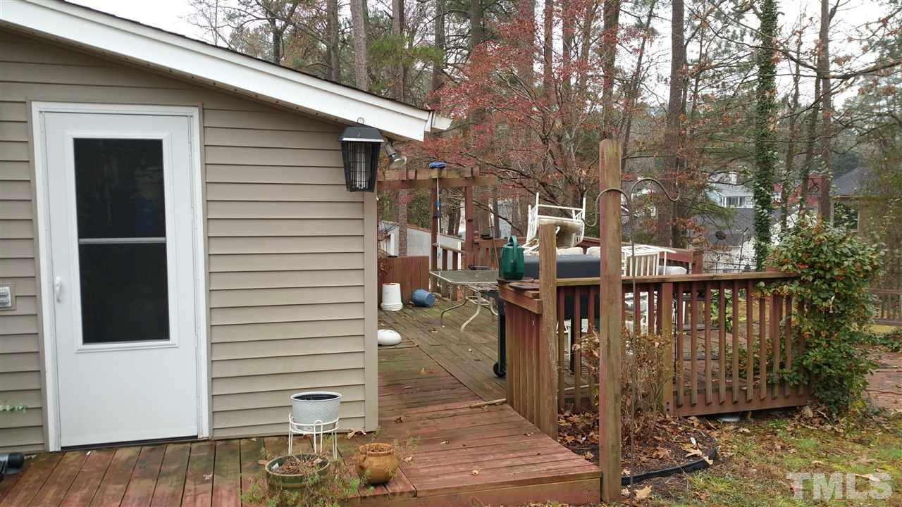 716 Cooper Road Raleigh, NC 27610 - Photo 20 of 25 a view of a balcony with chairs