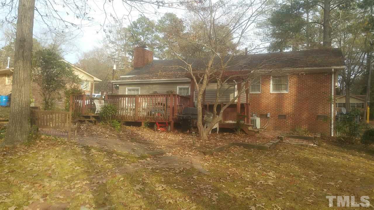 716 Cooper Road Raleigh, NC 27610 - Photo 24 of 25 a view of back yard of the house