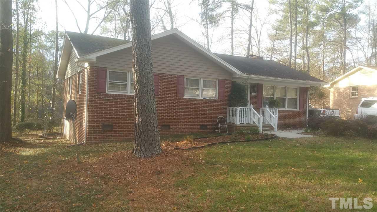 716 Cooper Road Raleigh, NC 27610 - Photo 25 of 25 a front view of house with yard