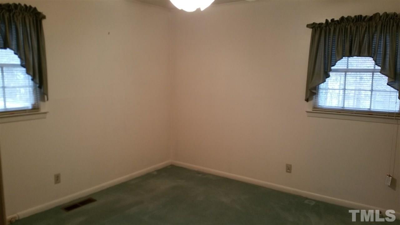 716 Cooper Road Raleigh, NC 27610 - Photo 9 of 25 a small space with a window