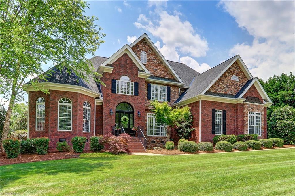 5501 Gray Leigh Drive Oak Ridge, NC 27310 - Photo 1 of 30 Immaculately maintained home with 3,750+ square feet, 3 large bedrooms, 3.5 bathrooms. Master Suite on Main Level. Covered back porch and large deck with Pergola offer multiple entertainment areas.
