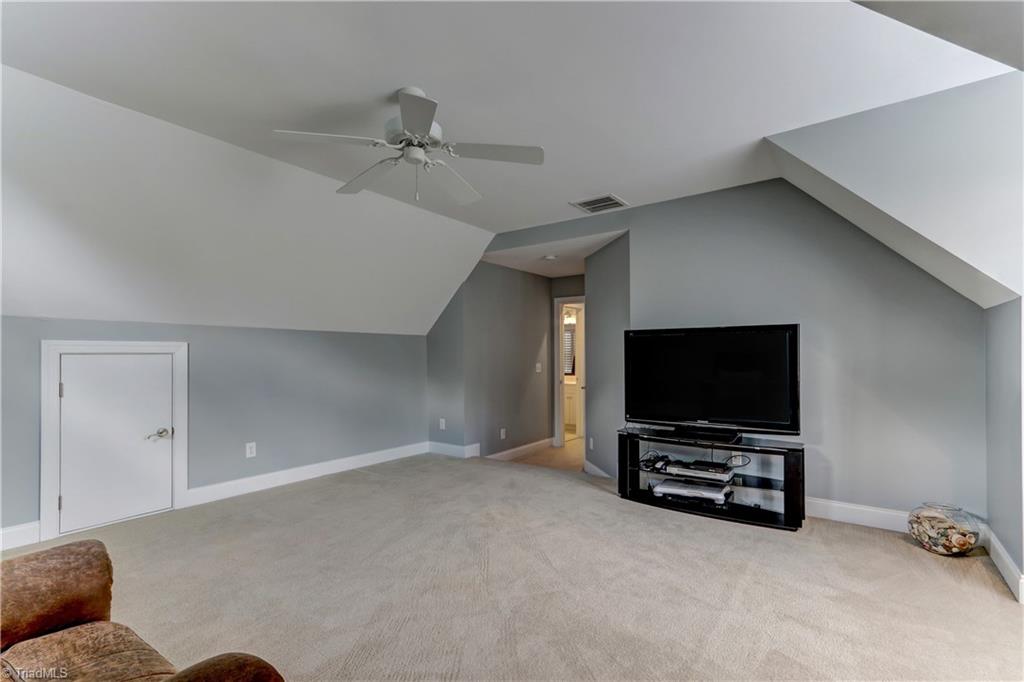 5501 Gray Leigh Drive Oak Ridge, NC 27310 - Photo 22 of 30 Another view of the Bonus Room. Access to two eve storage areas.