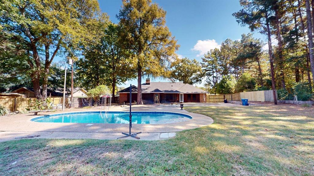 1110 Mill Run Road Athens, TX 75751 - Photo 21 of 24 a front view of a house with a yard and trees
