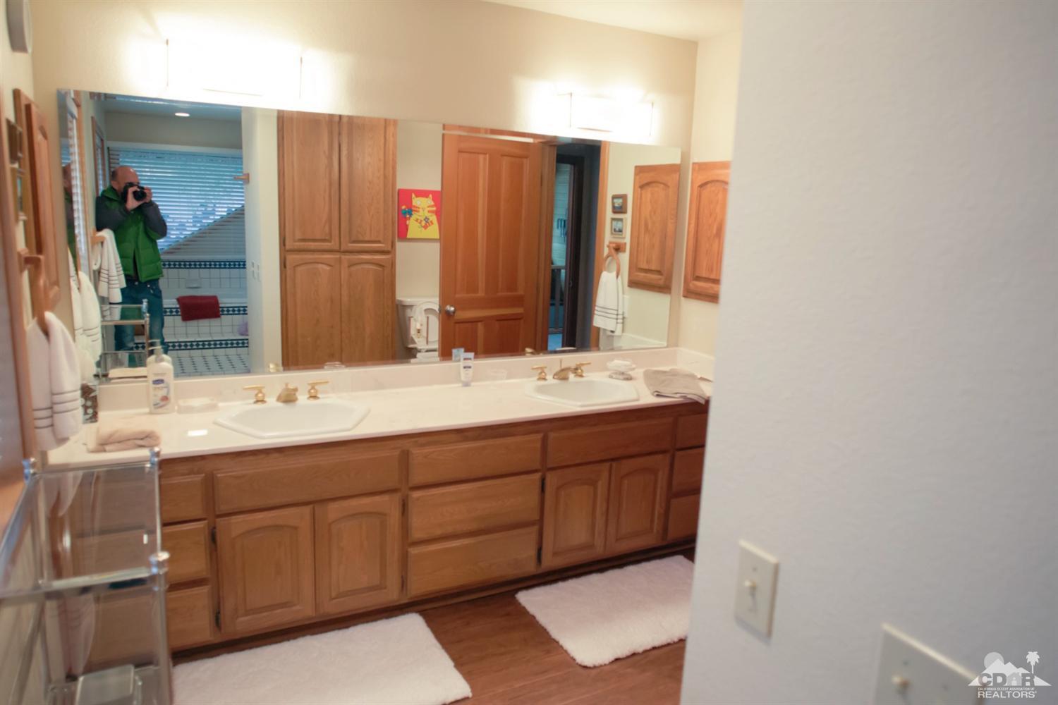 25037 Cougar Road Idyllwild, CA 92549 - Photo 13 of 73 a bathroom with a sink and a mirror