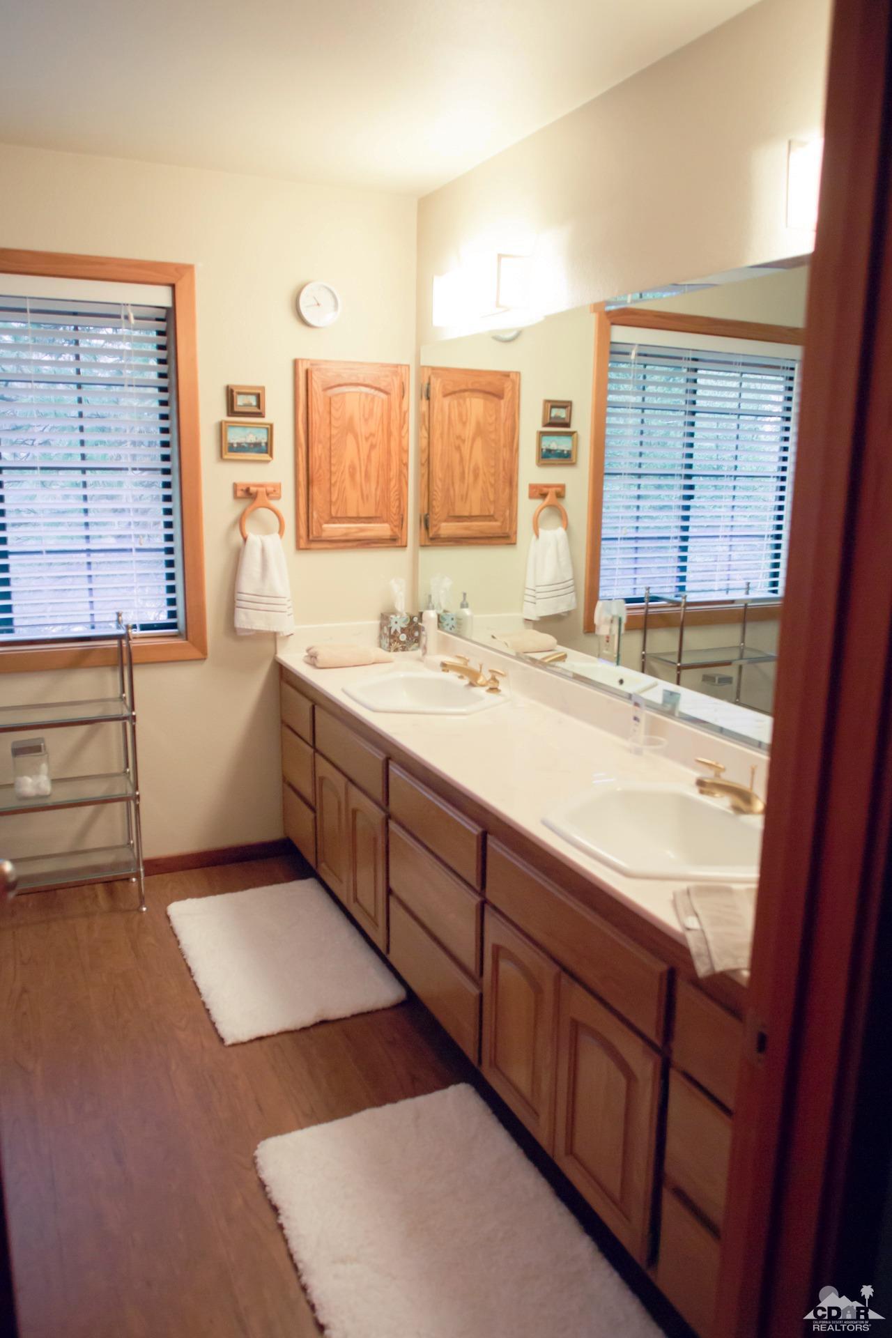 25037 Cougar Road Idyllwild, CA 92549 - Photo 14 of 73 a bathroom with a tub sink and mirror