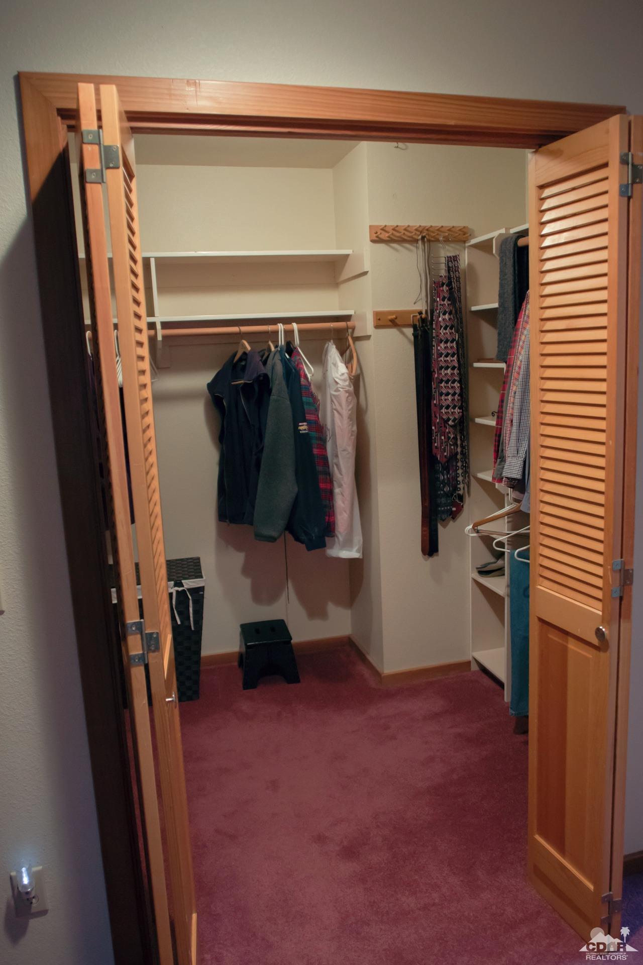 25037 Cougar Road Idyllwild, CA 92549 - Photo 22 of 73 a view of walk in closet with clothes and shoes