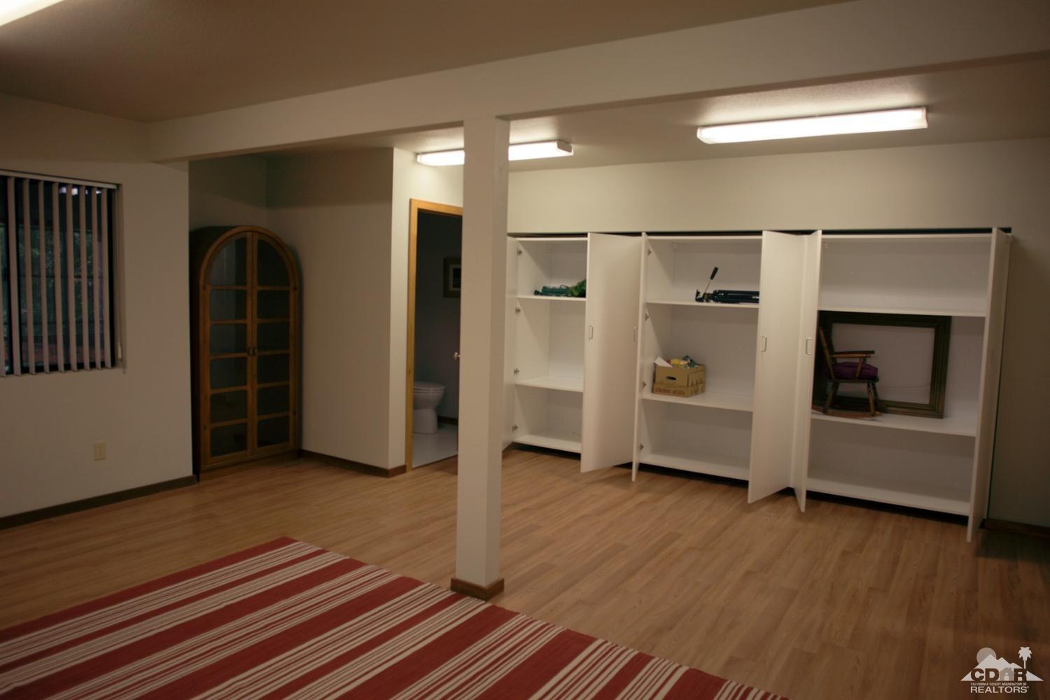 25037 Cougar Road Idyllwild, CA 92549 - Photo 3 of 73 a view of livingroom with furniture and wooden floor