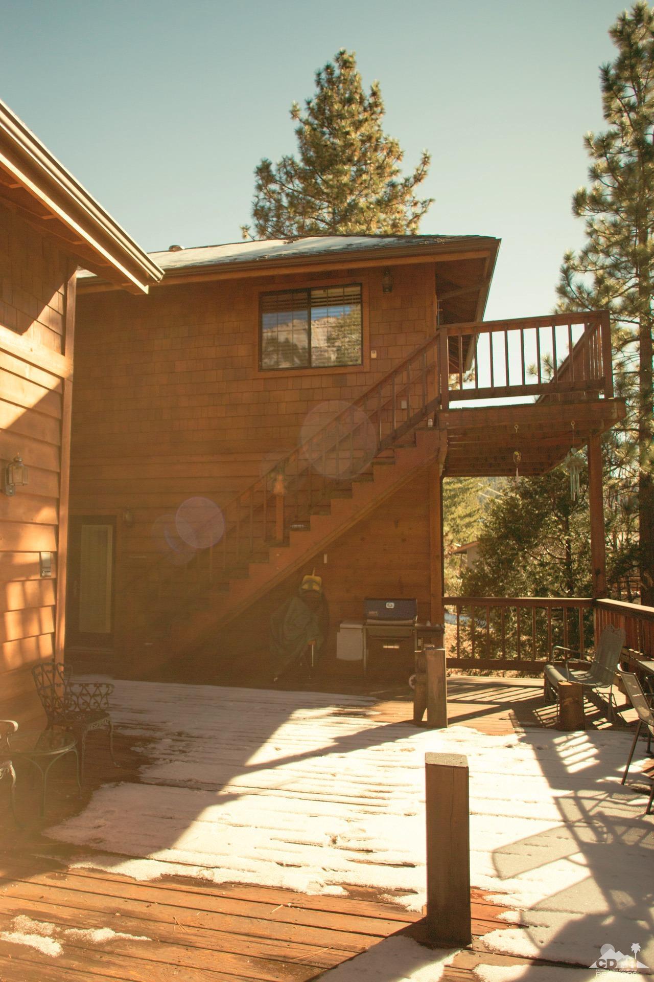 25037 Cougar Road Idyllwild, CA 92549 - Photo 32 of 73 a front view of a house with a yard