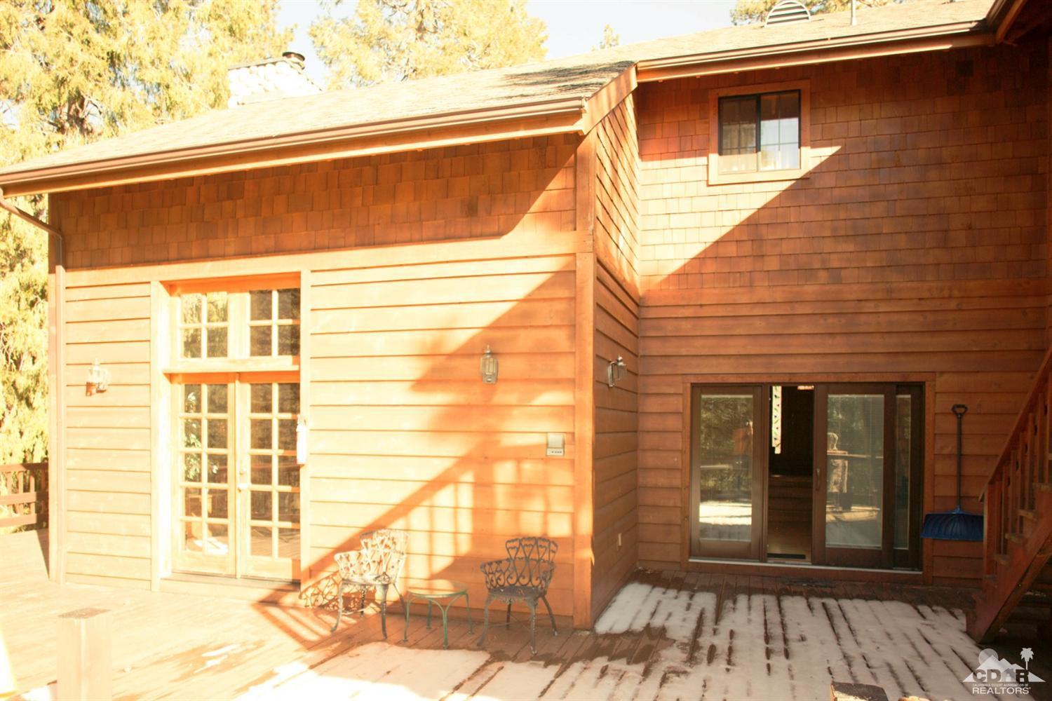 25037 Cougar Road Idyllwild, CA 92549 - Photo 37 of 73 a view of a house with a large window