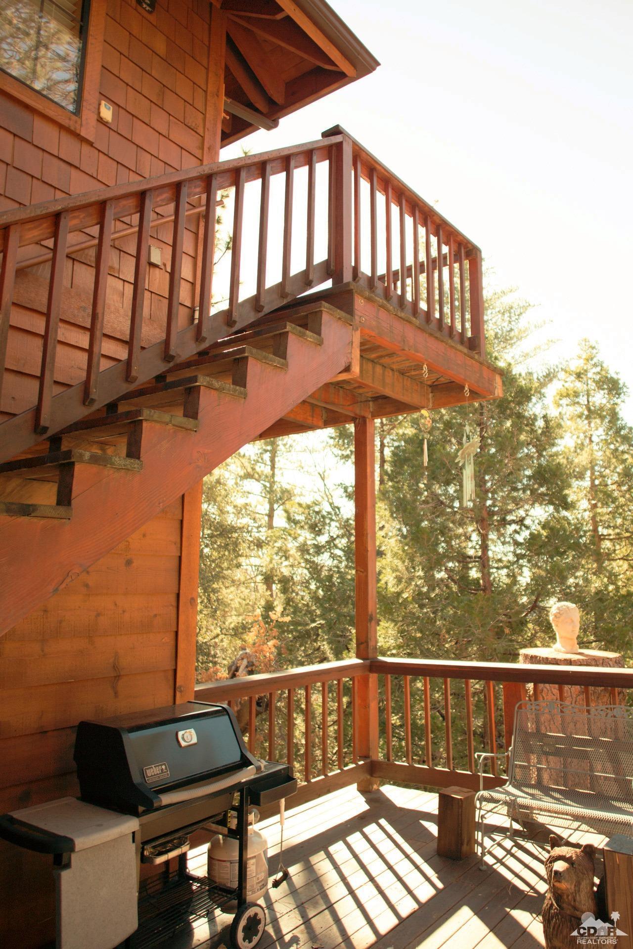 25037 Cougar Road Idyllwild, CA 92549 - Photo 38 of 73 a view of balcony with two chairs and a window