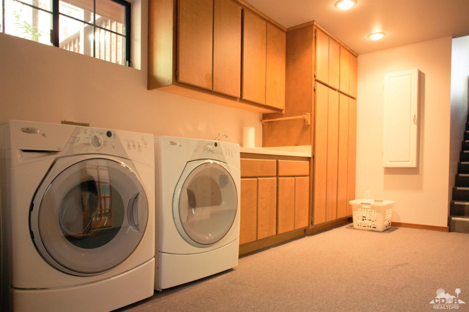 25037 Cougar Road Idyllwild, CA 92549 - Photo 57 of 73 a view of a storage & utility room with washer and dryer