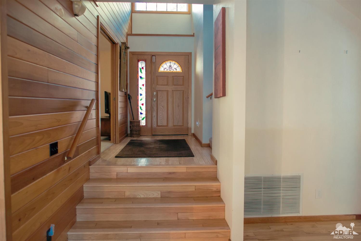 25037 Cougar Road Idyllwild, CA 92549 - Photo 62 of 73 a view of staircase with white walls and a window