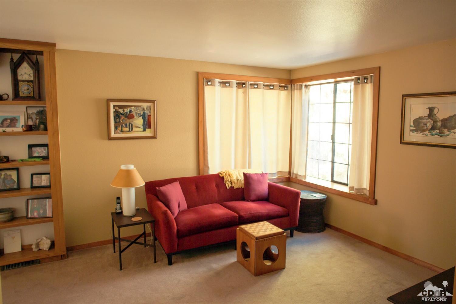 25037 Cougar Road Idyllwild, CA 92549 - Photo 71 of 73 a living room with furniture and a window