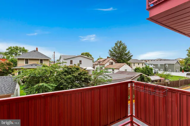 a view of a street from a balcony