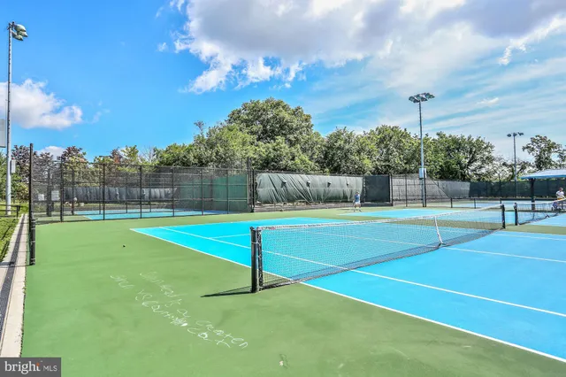 a view of a golf course with a lake