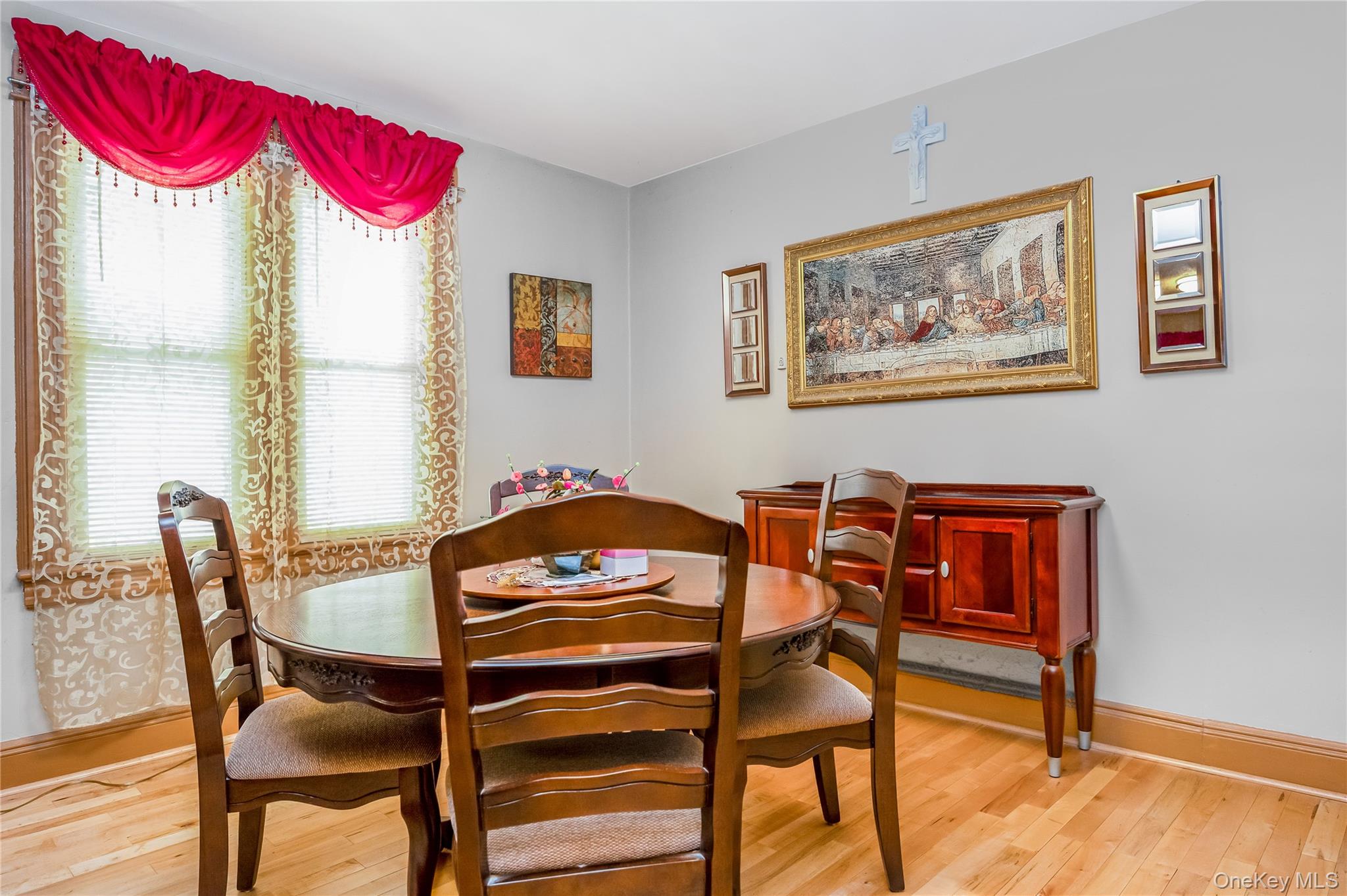 80-50 88th Road Queens, NY 11421 - Photo 10 of 21 a view of a dining room with furniture and window