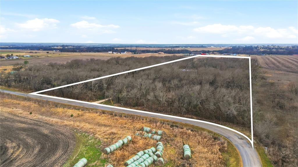 2421 Edwards Road Van Alstyne, TX 75495 - Photo 33 of 40 a view of a balcony with an ocean view