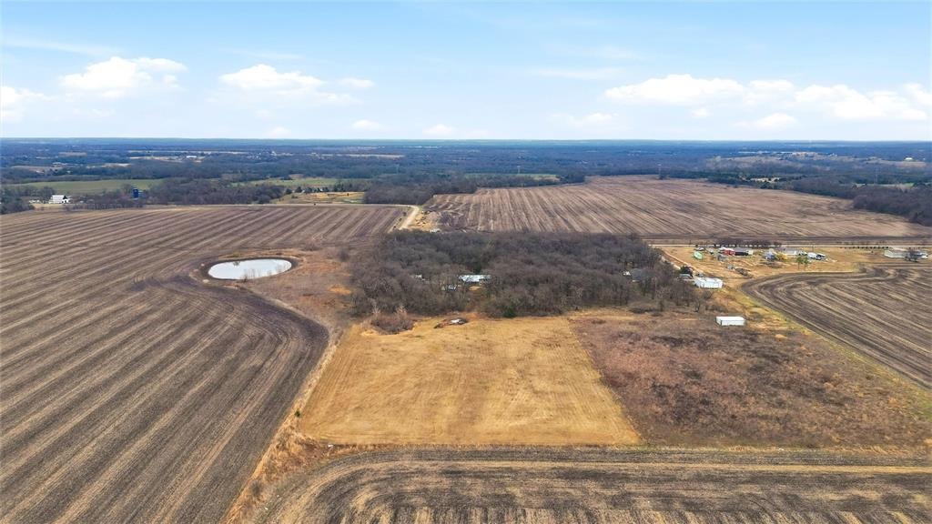 2421 Edwards Road Van Alstyne, TX 75495 - Photo 37 of 40 a view of a city street from a yard