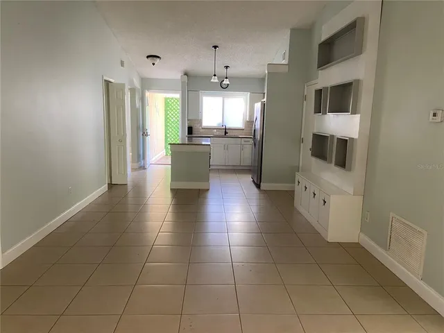 a bathroom with a mirror and a shower