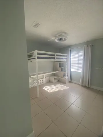 a bathroom with a sink a toilet and a shower