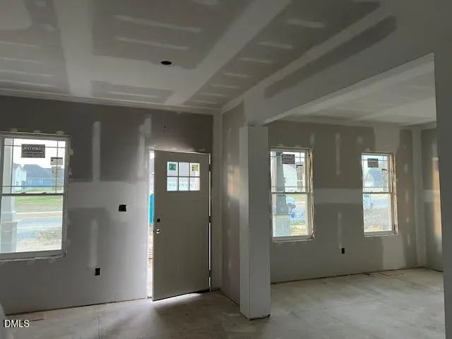 an empty room that has a window