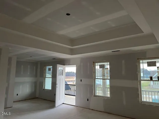 an empty room with windows