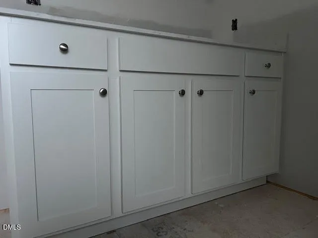 a view of room with cabinets