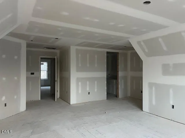 wooden floor and view of an empty room