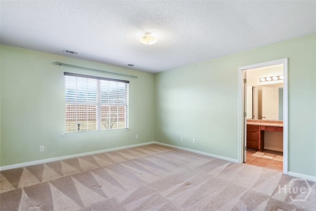 15 Victoria Court Pooler, GA 31322 - Photo 18 of 40 Primary view to back yard and bath