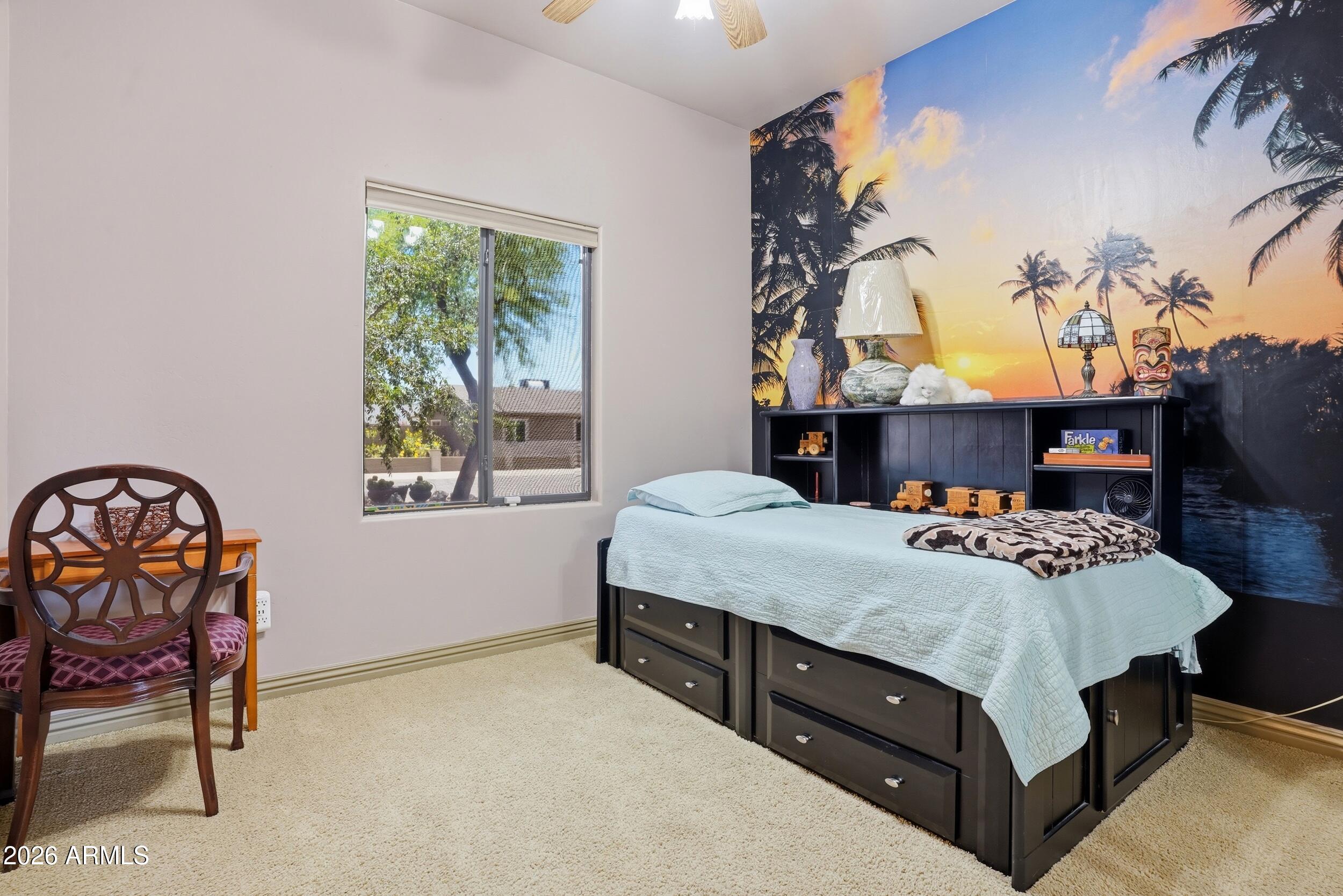 6334 East Albany Street Mesa, AZ 85205 - Photo 37 of 72 a bedroom with a bed and a window