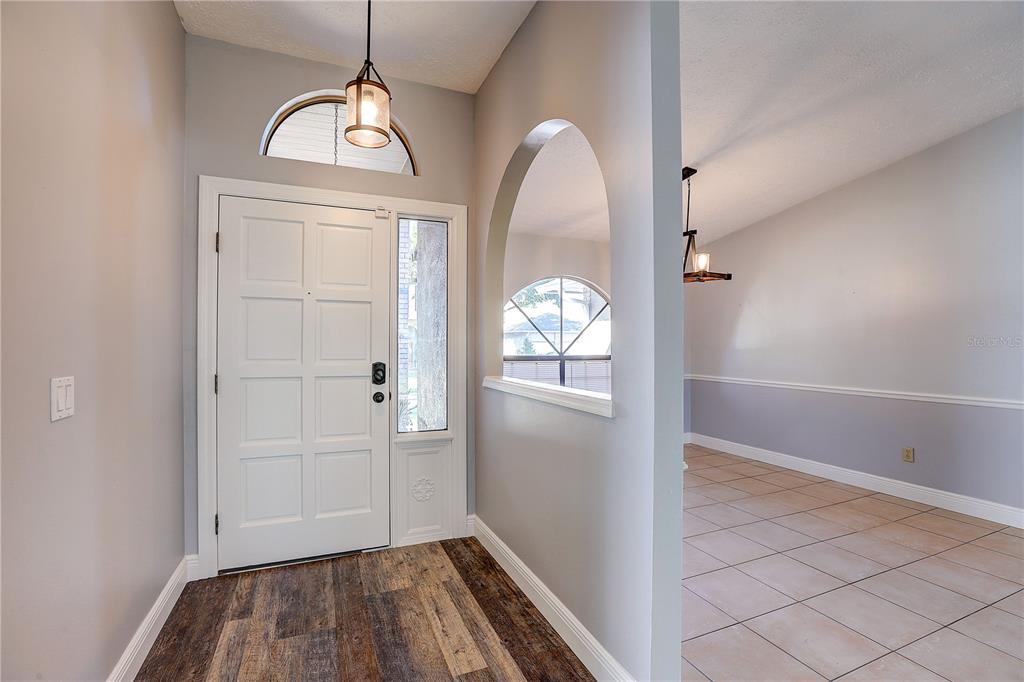 1418 Buckner Road Valrico, FL 33596 - Photo 4 of 37 wooden floor in an empty room