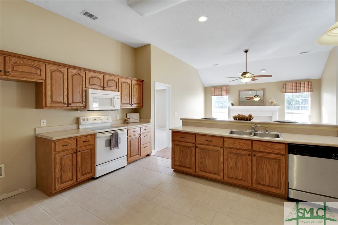 304 Walthour Drive Rincon, GA 31326 - Photo 8 of 40 Large Kitchen has tons of counter space over looki