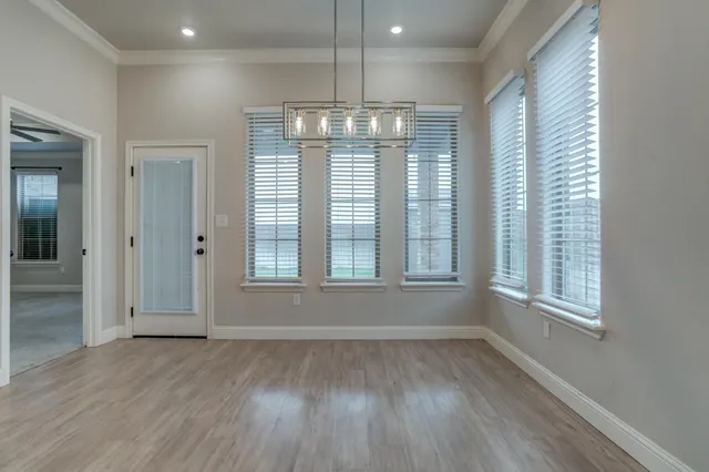 a bathroom with a tub a sink shower and mirror