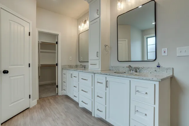 a view of an empty walk in closet