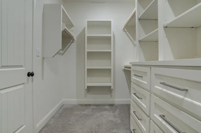 a bathroom with 2 sink and a mirror
