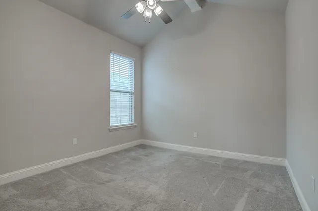 a view of a back yard of the house