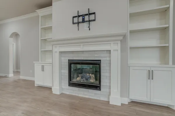 a living room with a fireplace