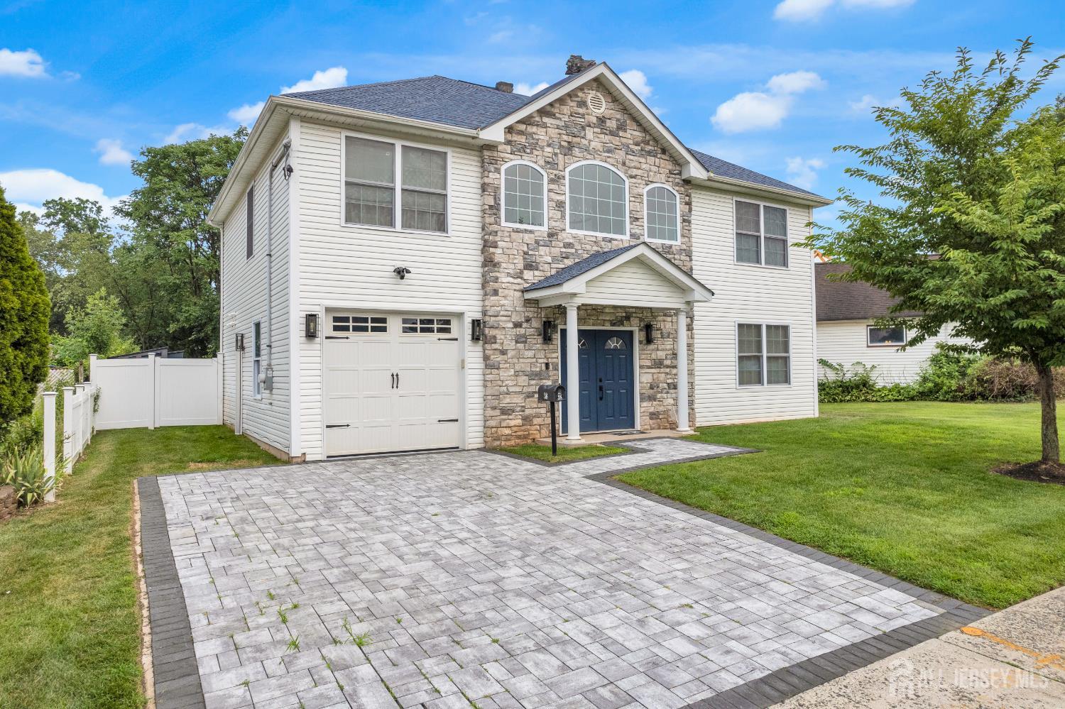 38 Sturgis Road Edison, NJ 08817 - Photo 1 of 41 a front view of a house with a yard
