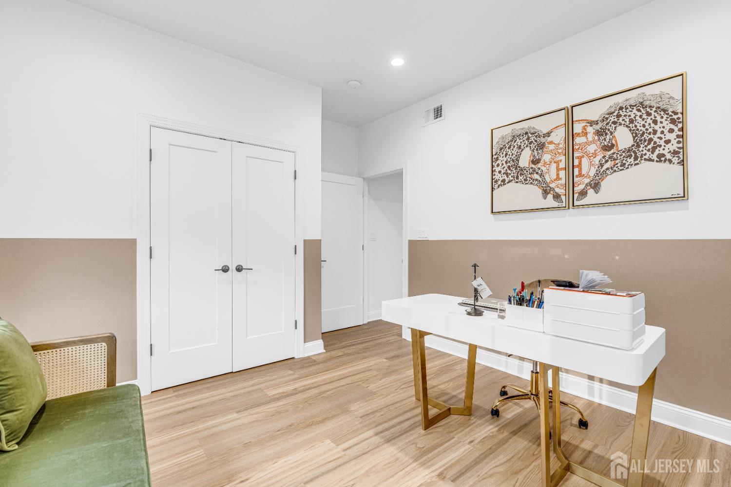 38 Sturgis Road Edison, NJ 08817 - Photo 19 of 41 a view of a workspace with furniture and wooden floor