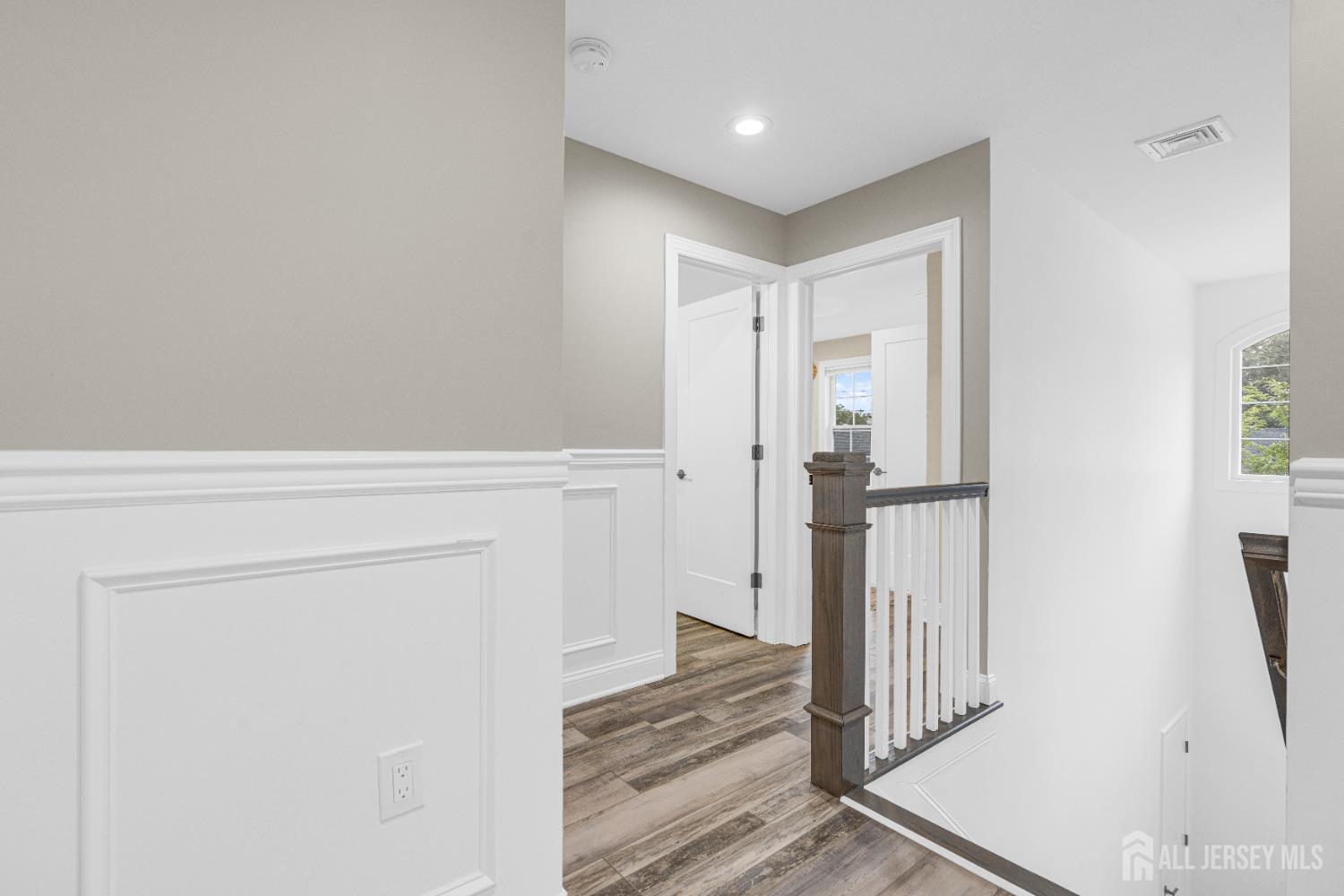 38 Sturgis Road Edison, NJ 08817 - Photo 21 of 41 a view of a hallway with wooden floor and staircase