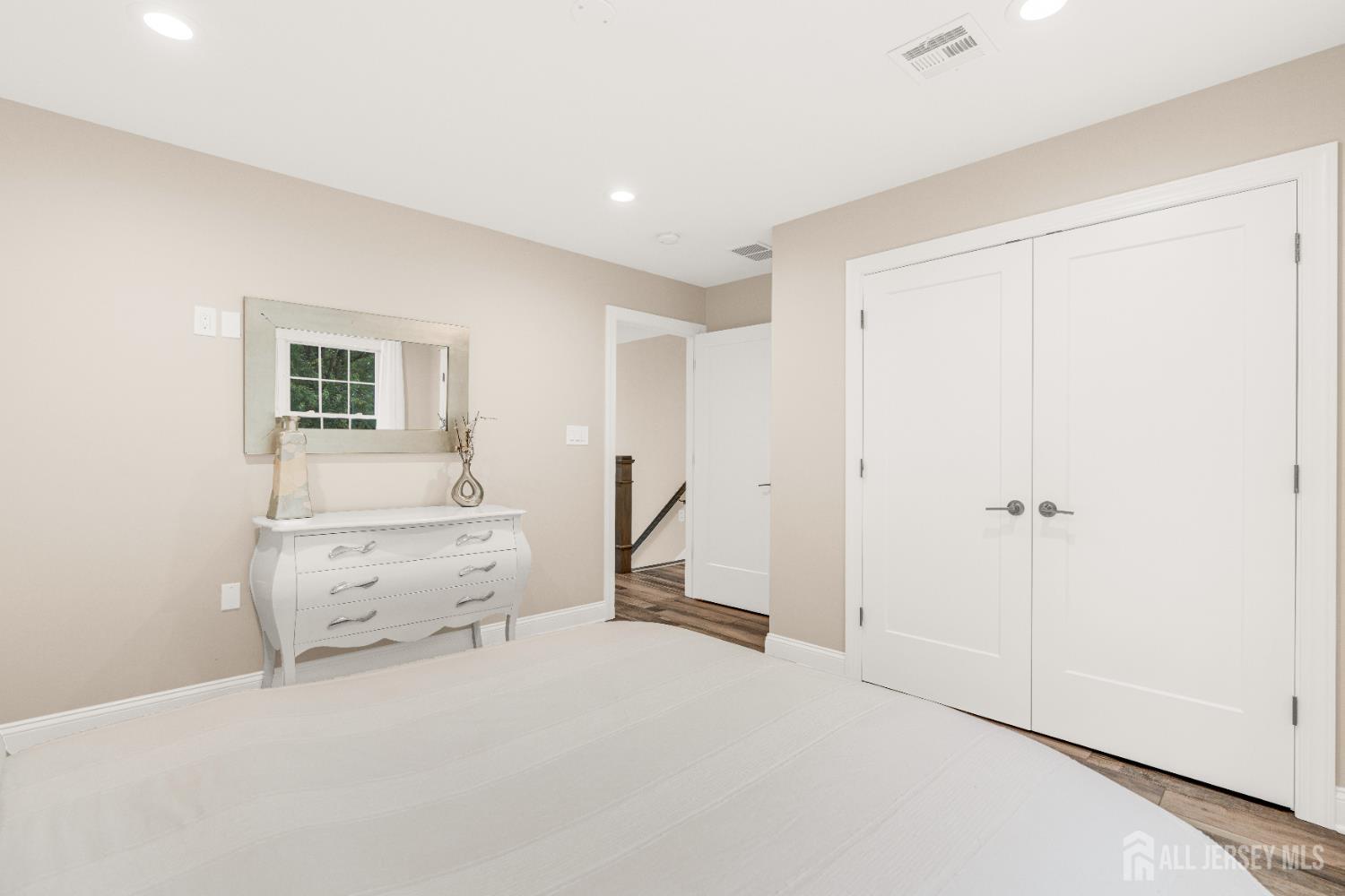 38 Sturgis Road Edison, NJ 08817 - Photo 27 of 41 a room with a bed and furniture
