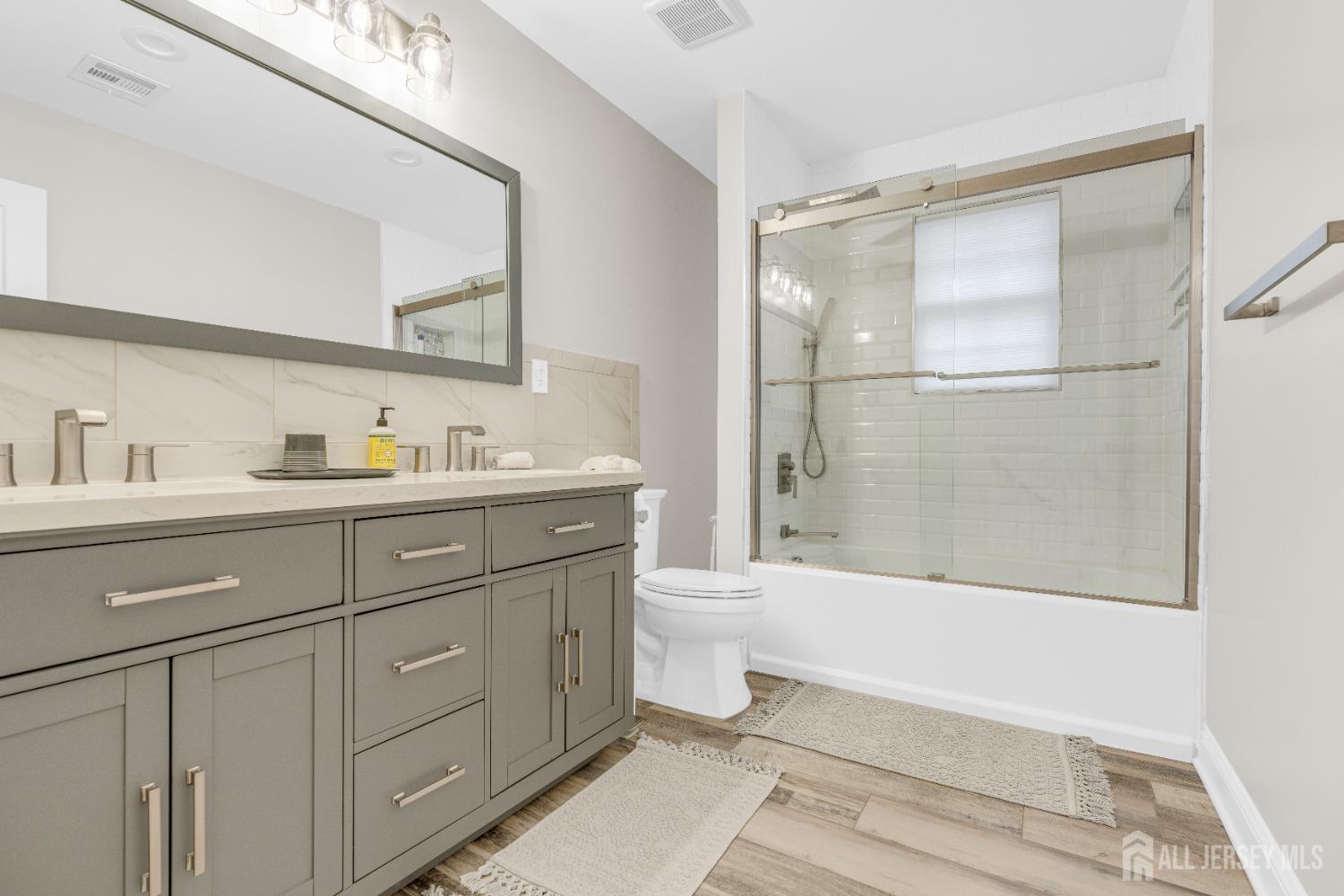 38 Sturgis Road Edison, NJ 08817 - Photo 32 of 41 a bathroom with a sink a toilet and shower