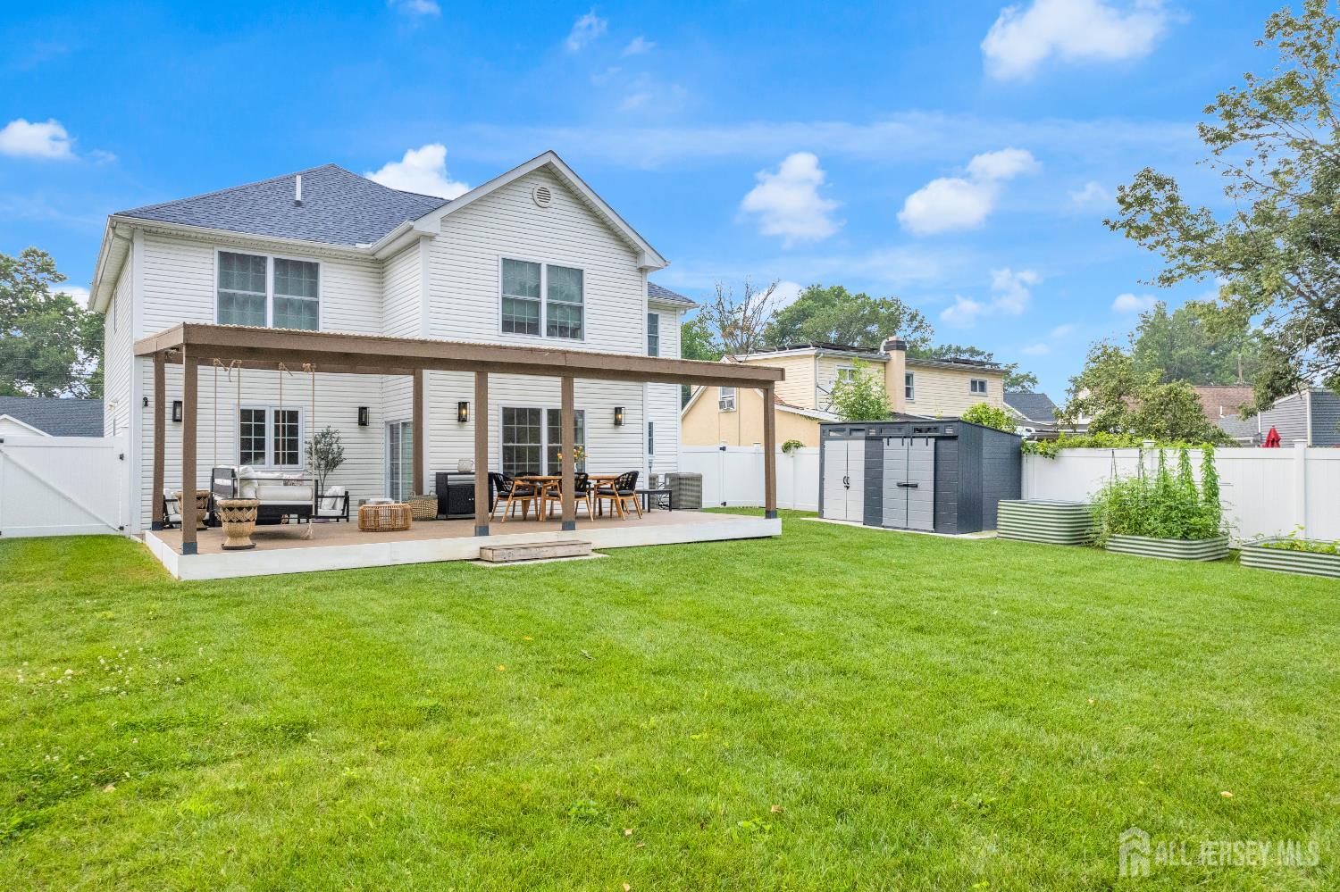 38 Sturgis Road Edison, NJ 08817 - Photo 35 of 41 a front view of a house with yard patio and swimming pool